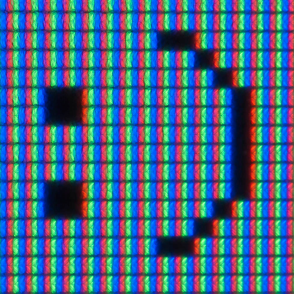 A close up of a computer screen displaying a smiling emoji